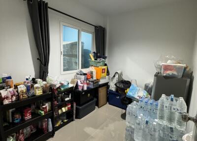 Storage room with various supplies and water bottles