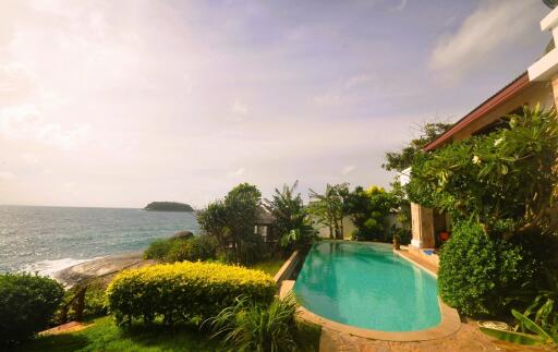 Scenic view of an outdoor pool with ocean view