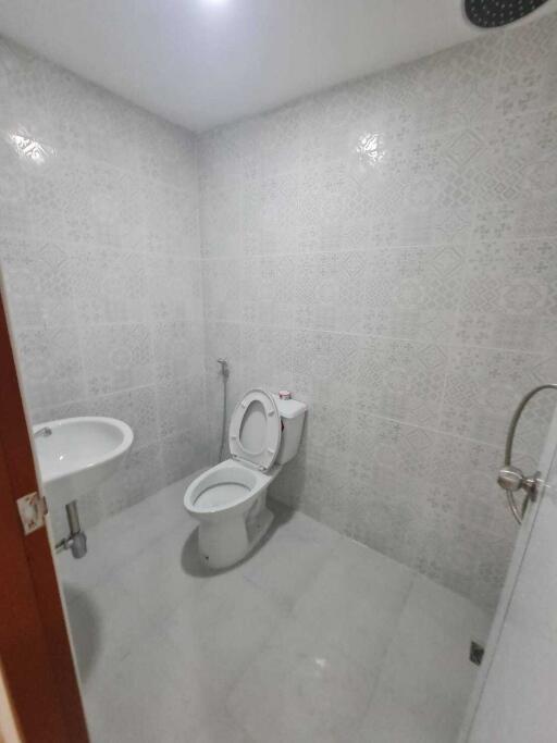 Bathroom with toilet and sink