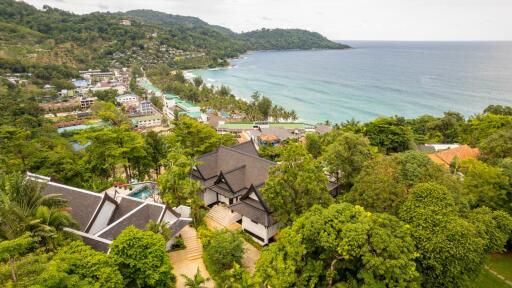 Aerial view of coastal area with buildings and greenery