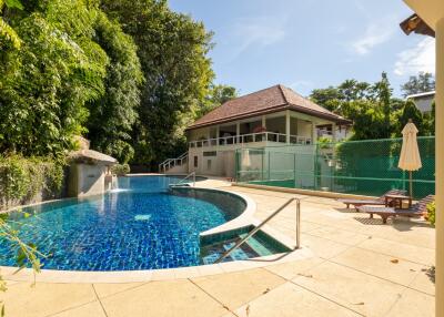 Outdoor area with pool and attached house