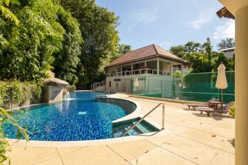 Outdoor area with pool and attached house