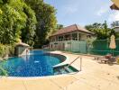 Outdoor area with pool and attached house