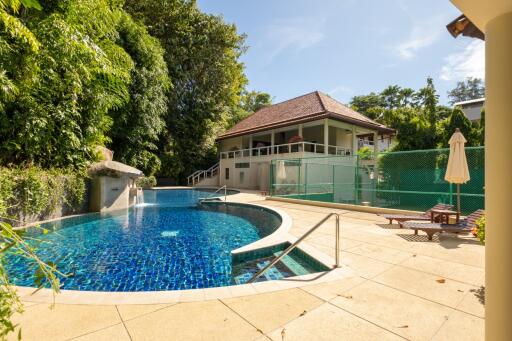 Outdoor area with pool and attached house