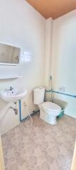 Small bathroom with essential fixtures