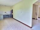 Spacious kitchen area with adjacent hallway