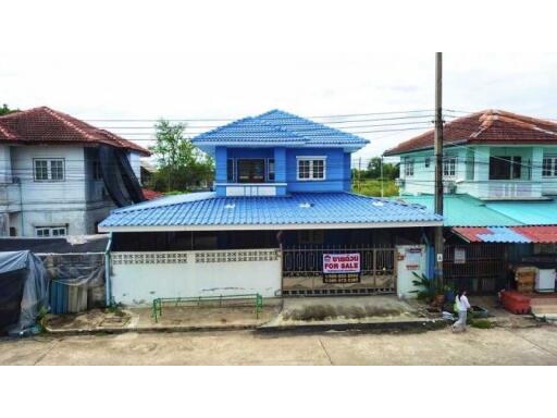 Two-story blue house available for sale