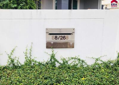 Building facade with address plaque