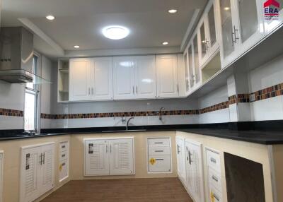 Modern kitchen with white cabinetry