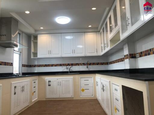 Modern kitchen with white cabinetry