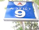 Outdoor signage with number 9