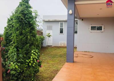 Outdoor area with garden and tiled patio