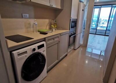 Modern kitchen with appliances and outdoor view