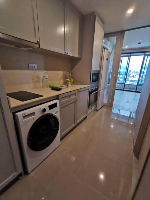 Modern kitchen with appliances and outdoor view