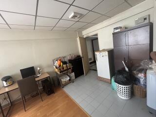 small office with various storage and workspace setup