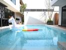 Outdoor pool area with floaties