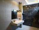 Modern bathroom with textured tiles and large mirror