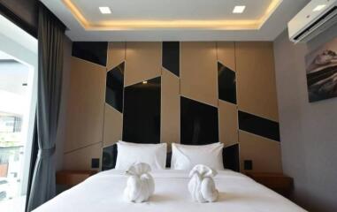 Modern bedroom with stylish wall design