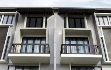 Exterior view of a modern residential building with balconies