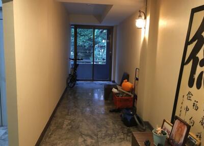 hallway with marble floor and wall decorations