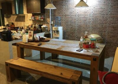 Rustic kitchen with wooden dining table and bench