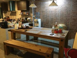 Rustic kitchen with wooden dining table and bench