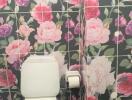 Bathroom with floral wall tiles and toilet