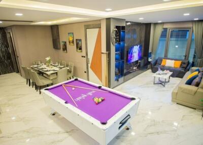 Modern living space with a pool table