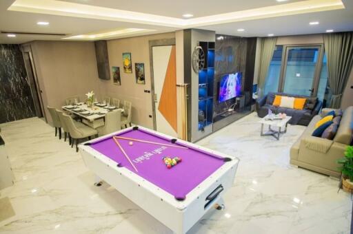 Modern living space with a pool table