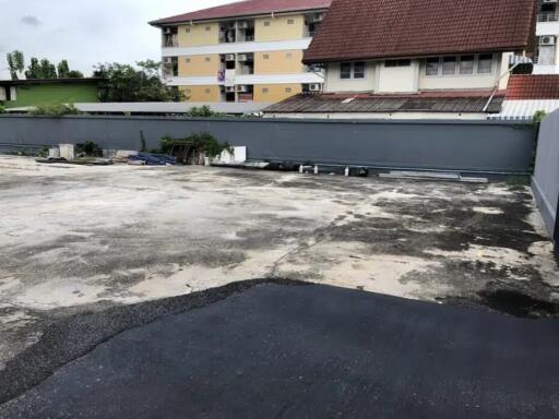 Parking area with surrounding buildings