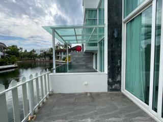 Patio with waterfront view