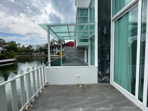 Patio with waterfront view