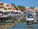 Marina with yachts and waterfront properties