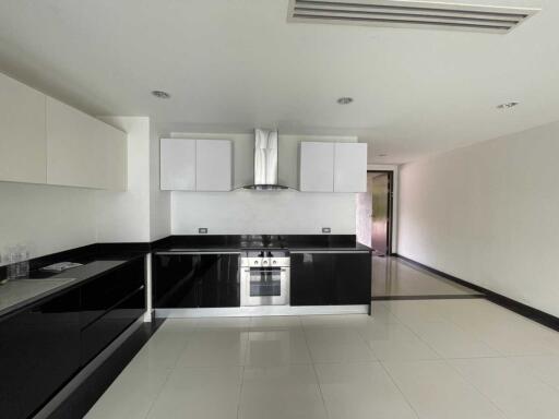 Modern kitchen with black and white cabinetry