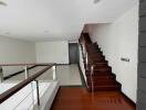 Modern Staircase with Wooden Steps and Glass Balustrade