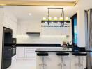 Modern kitchen with island and bar stools