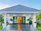 Modern house exterior with garden and driveway