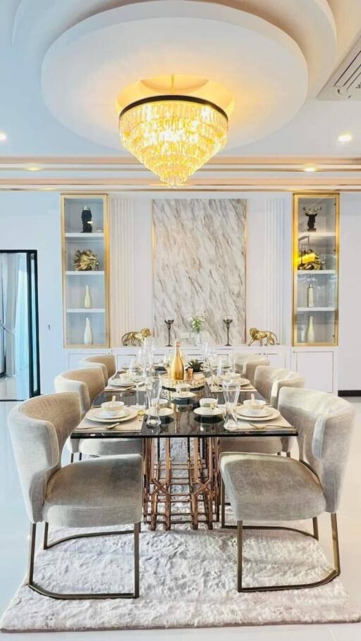 Elegant dining room with chandelier and modern decor