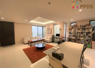 Modern and spacious living room with ample natural light