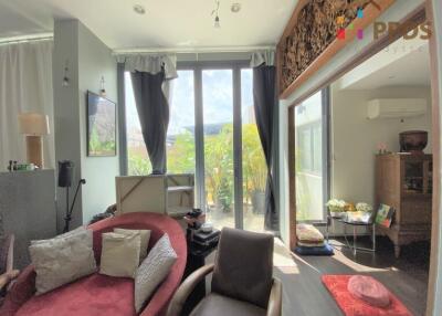 Living room with ample natural light and modern decor