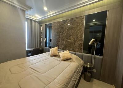 Modern bedroom with a large bed and stylish decor