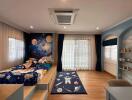 Space-themed children's bedroom with wooden floor and large window