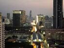 Evening city view with buildings and traffic