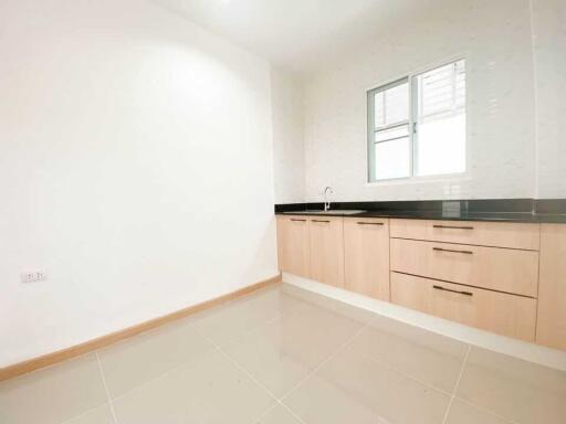 Modern kitchen with ample countertop and storage space