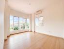 Spacious and bright living room with large windows