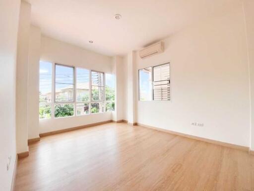 Spacious and bright living room with large windows