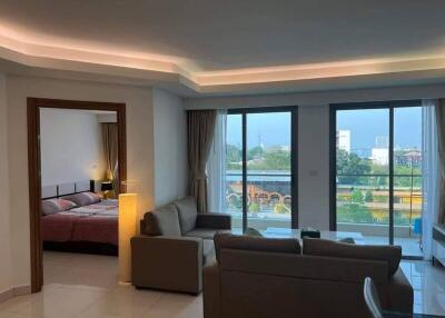 Modern living room with view and adjacent bedroom