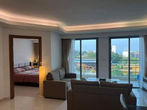 Modern living room with view and adjacent bedroom