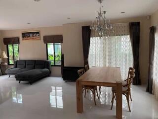 Modern living room with sofa and dining area