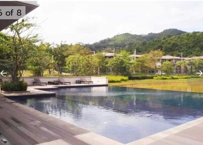 Pool overlooking green scenery